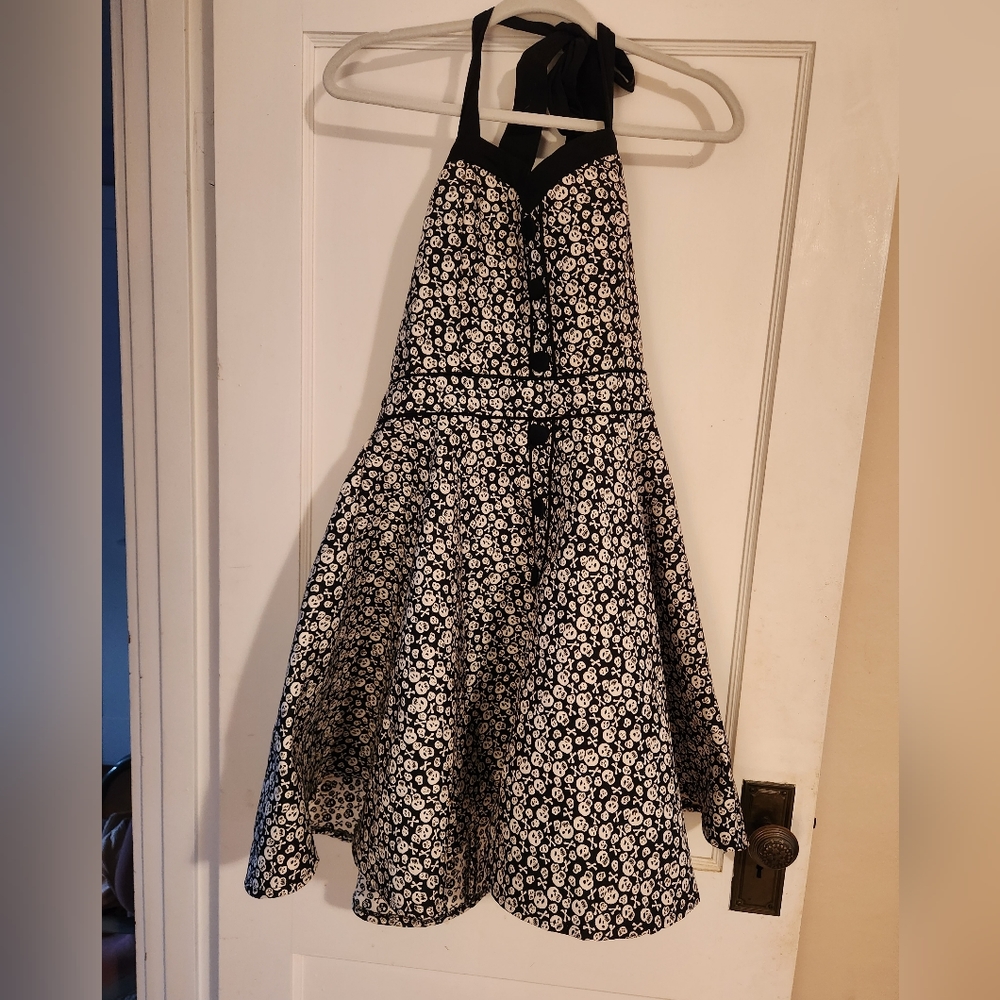 Adorable but sexy, rockabilly halter dress. Size Large